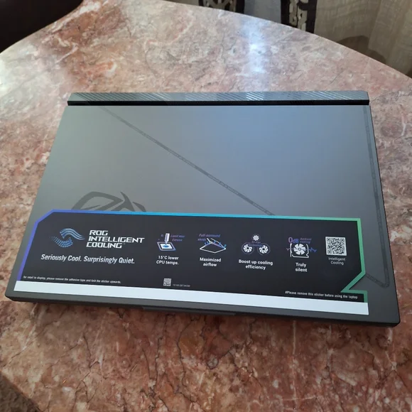 Rog Astrid G 16 volt green/ Eclipse Gray gaming laptop